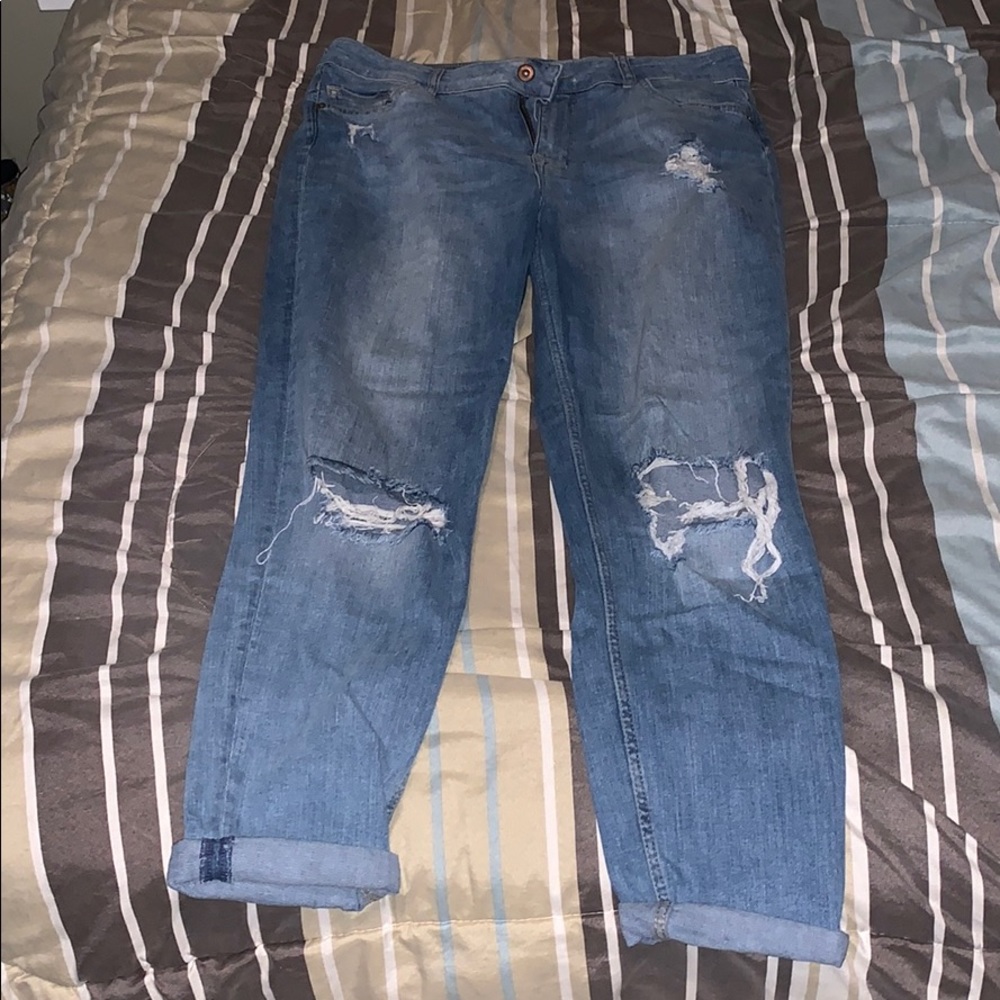 Ripped boyfriend jeans.